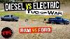 Diesel Vs Electric Tug Of War Ford F 150 Lightning Takes On The Ram 2500 Cummins In A Nail Biter