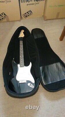 Electric guitar + amplifier + stand + heavy duty case