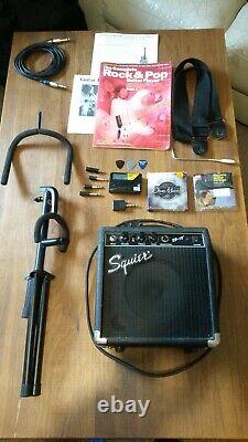 Electric guitar + amplifier + stand + heavy duty case